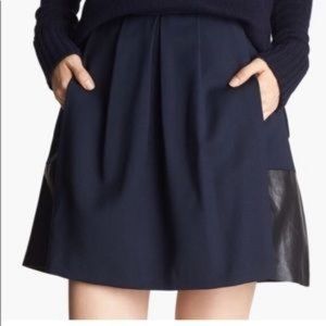 Vince pleated navy wool mini skirt w/black leather trim, size 2